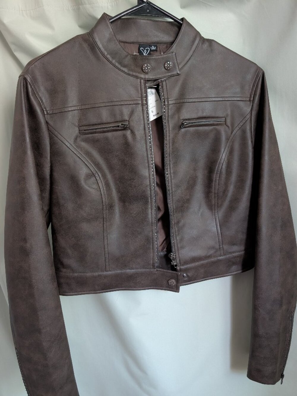 Brown cafe racer-style motorcycle jacket